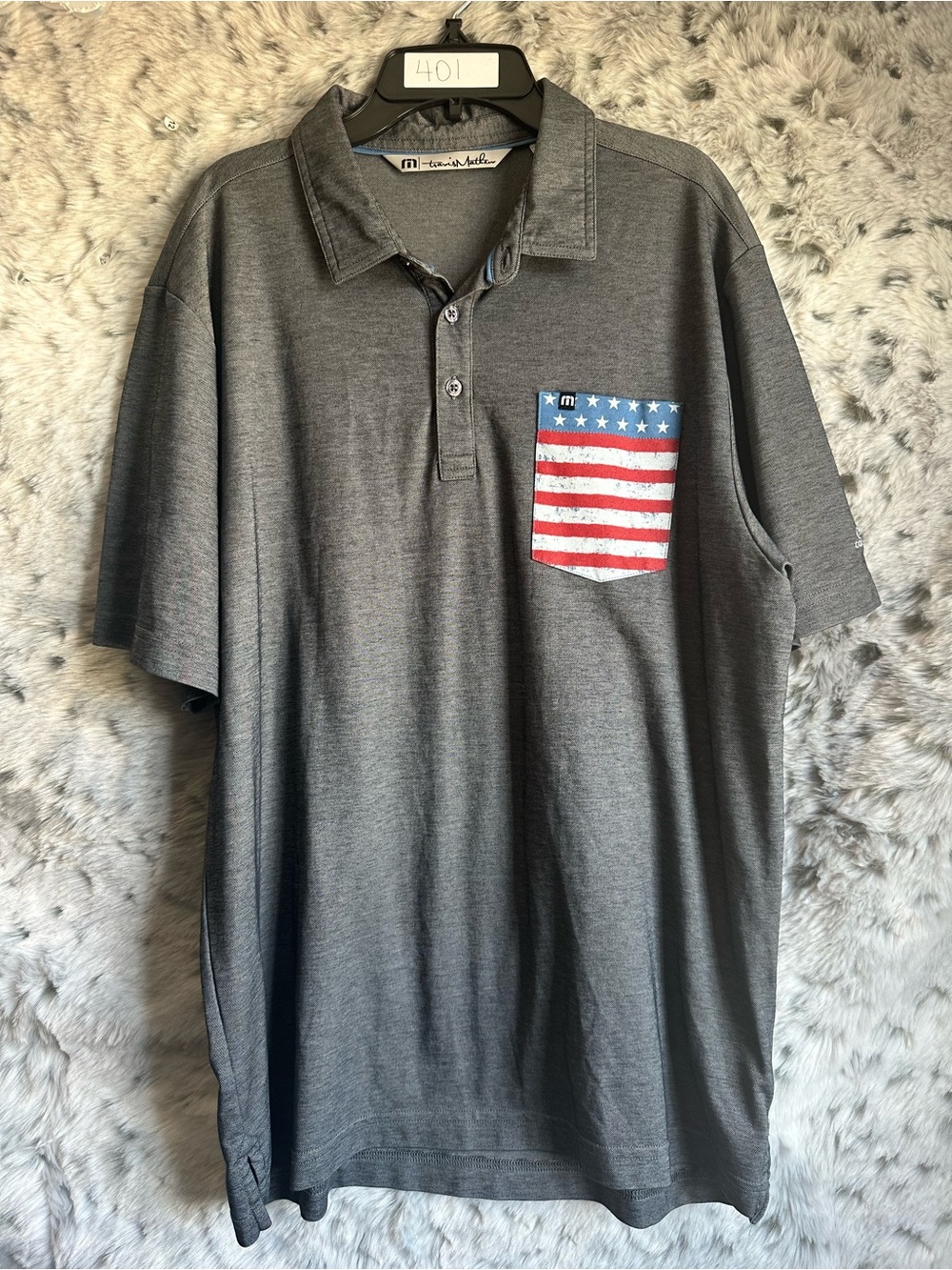 401.  Travis Mathew gray polo sz large